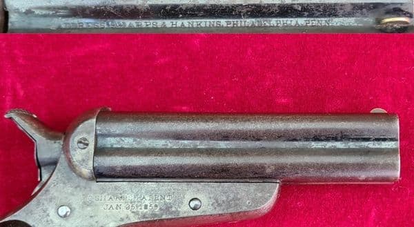 A fine  example of a SHARPS four barrelled .32 cal rim-fire derringer. Circa 1865. Ref 3839.